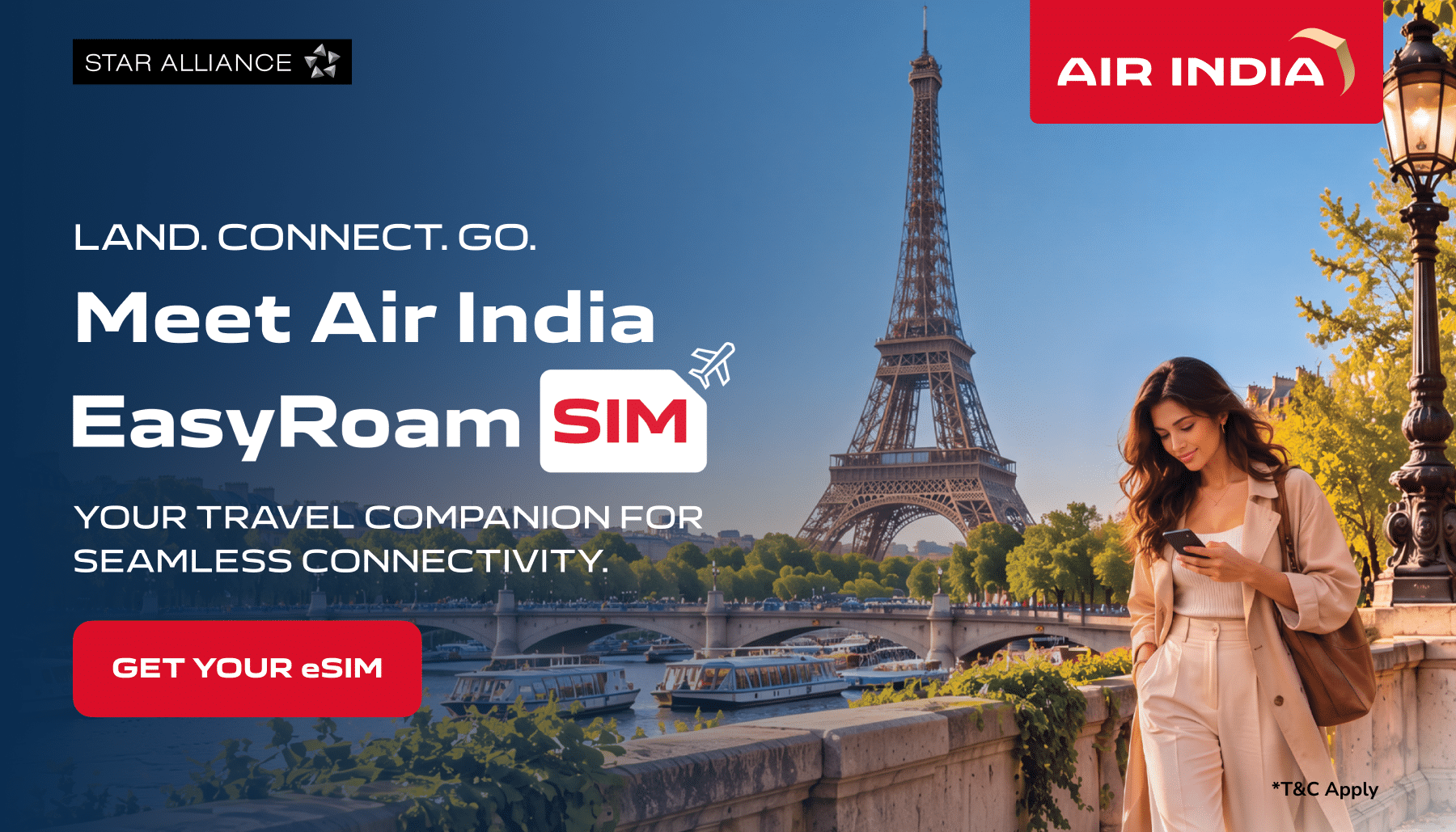 Air India EasyRoam eSIM campaign showing a traveller using her phone near the Eiffel Tower