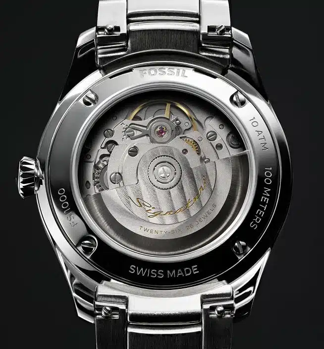 Fossil Signature CS-1 FSI1000 exhibition caseback showing the automatic movement and Signature rotor