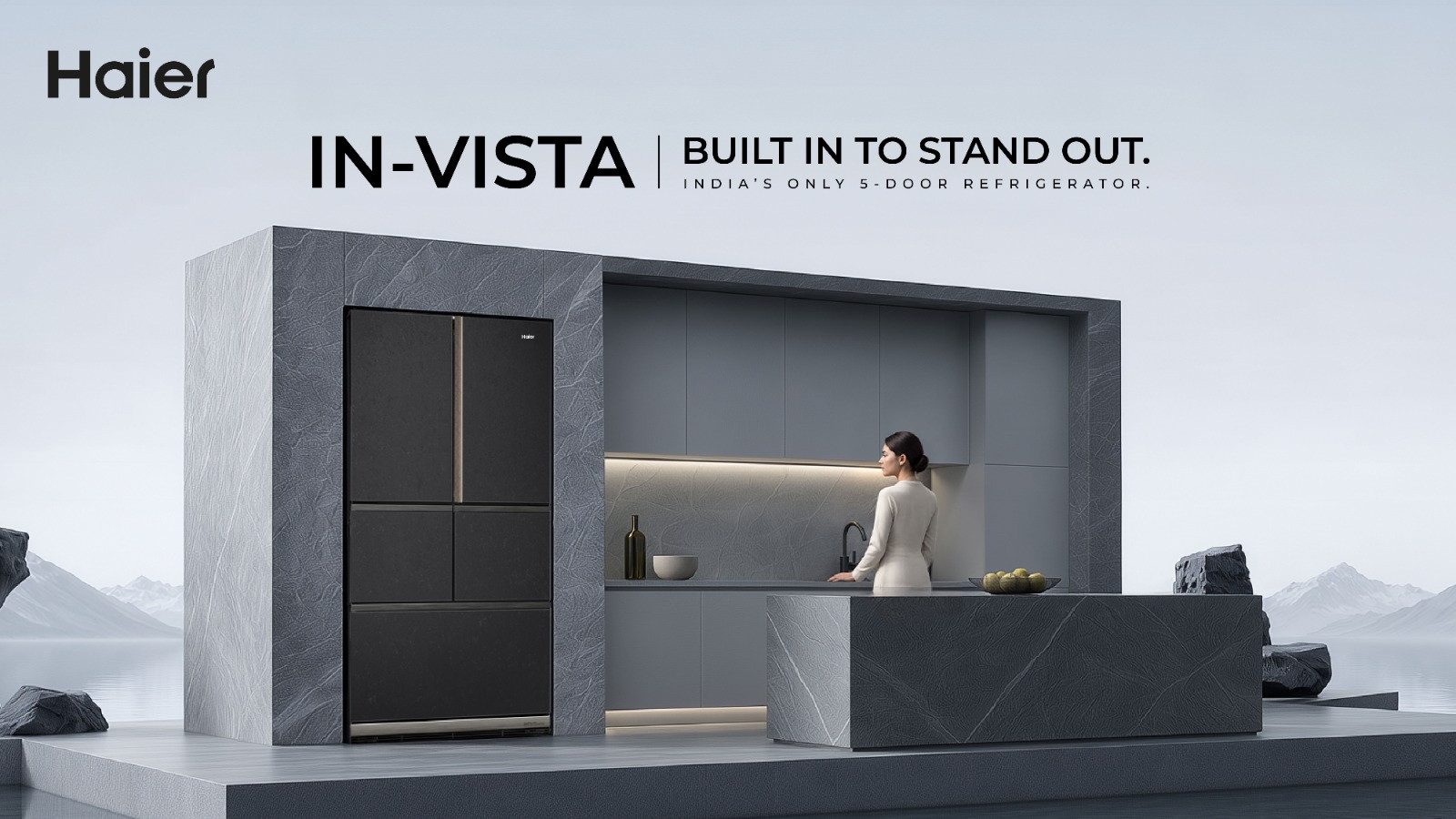 Haier In-Vista five-door refrigerator beside kitchen cabinetry