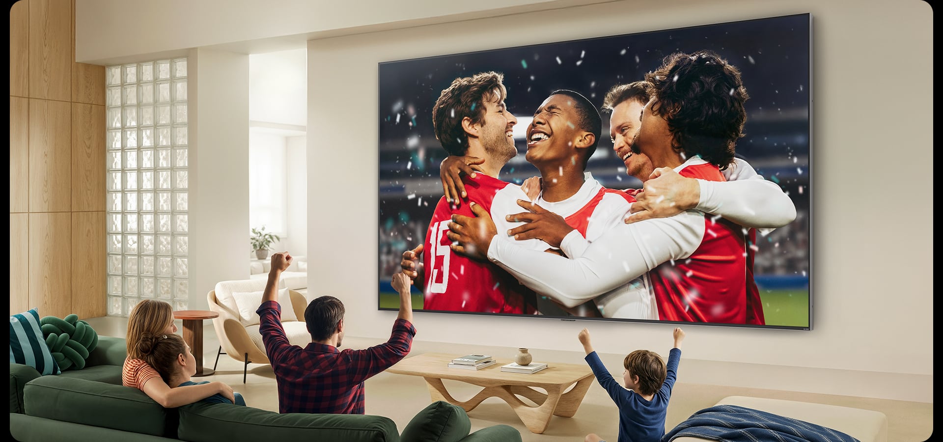 LG 115-inch QNED90 Mini LED TV showing a football match in a living room
