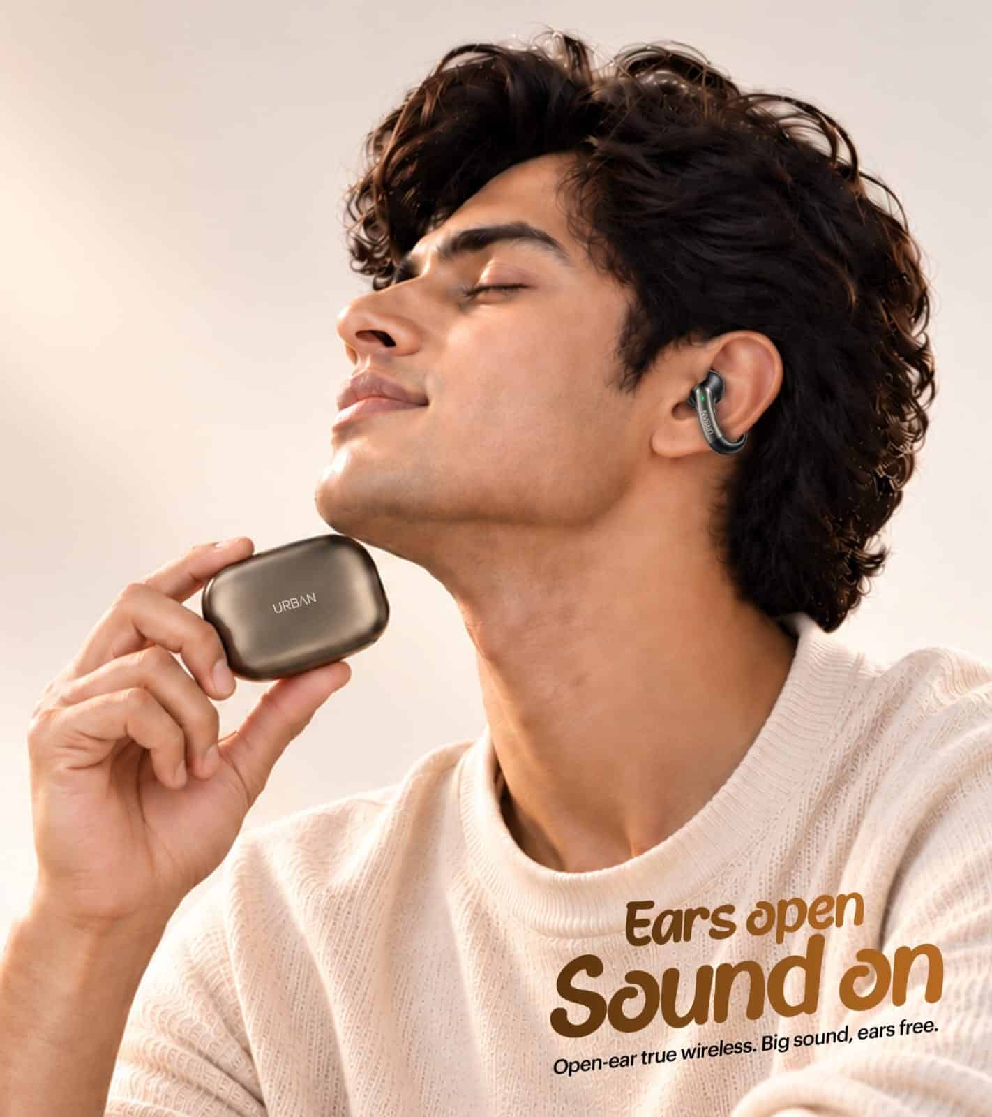 URBAN VIBE POD OWS worn around the ear with its charging case